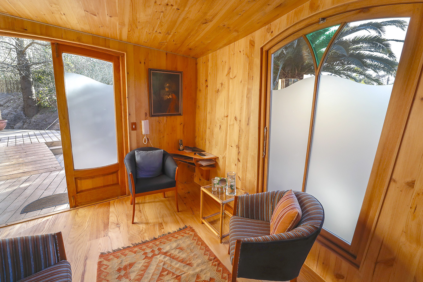 The big doors of Heartwood from inside, opening onto the deck